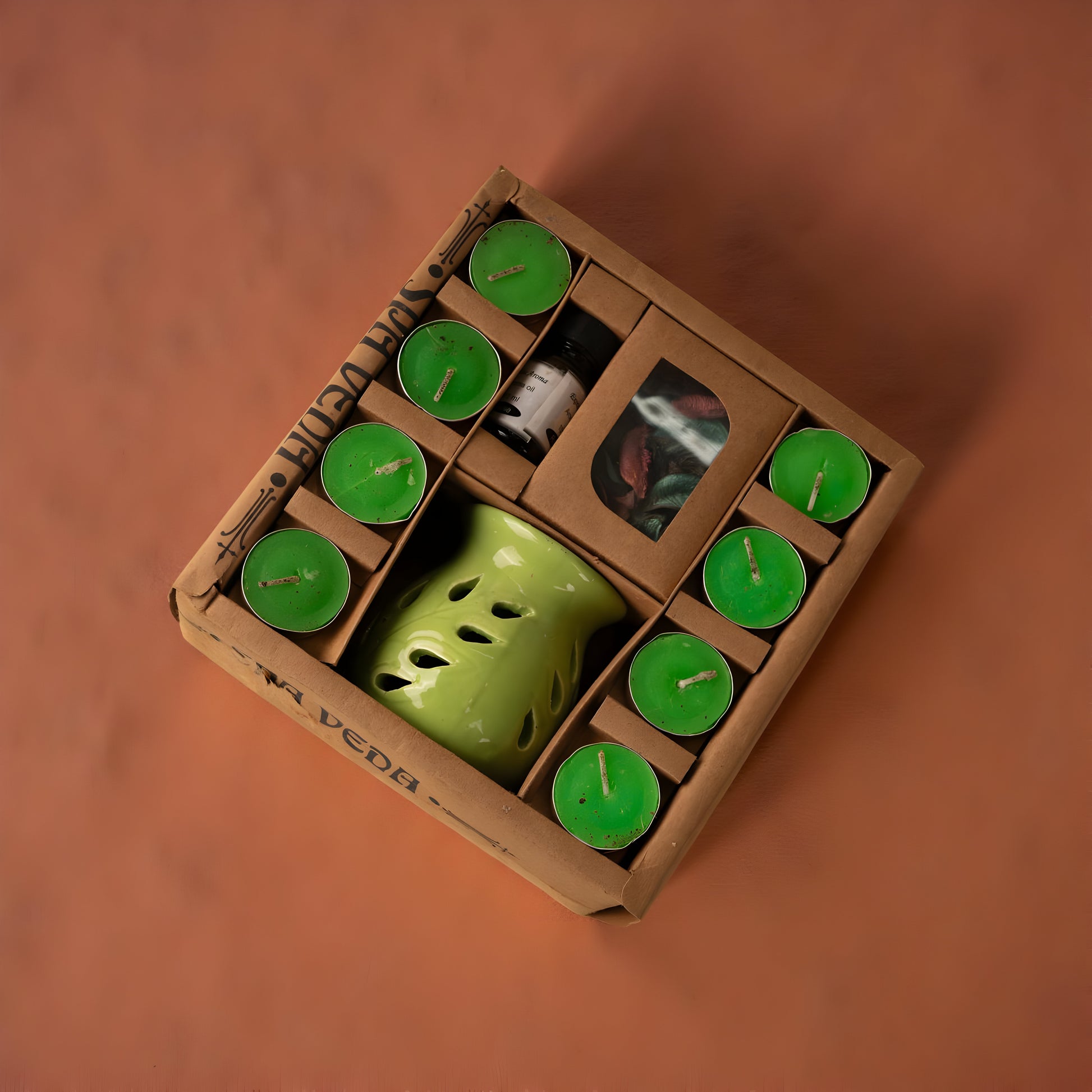 Ceramic aroma diffuser with tealight candles and oil by Abiir.