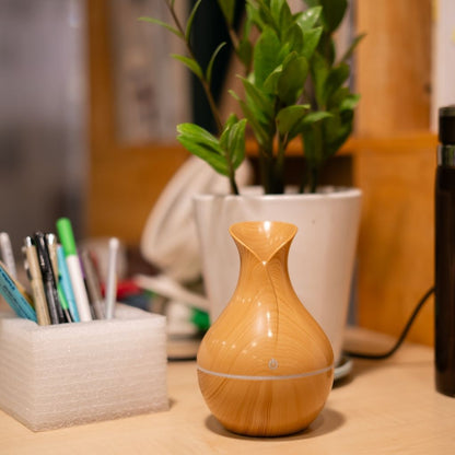 Wood grain vase-shaped aroma diffuser & ultrasonic humidifier by Abiir.