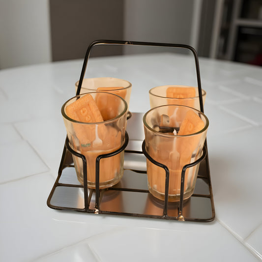 Cutting chai glass candle set with 4 scented candles and metal holder.